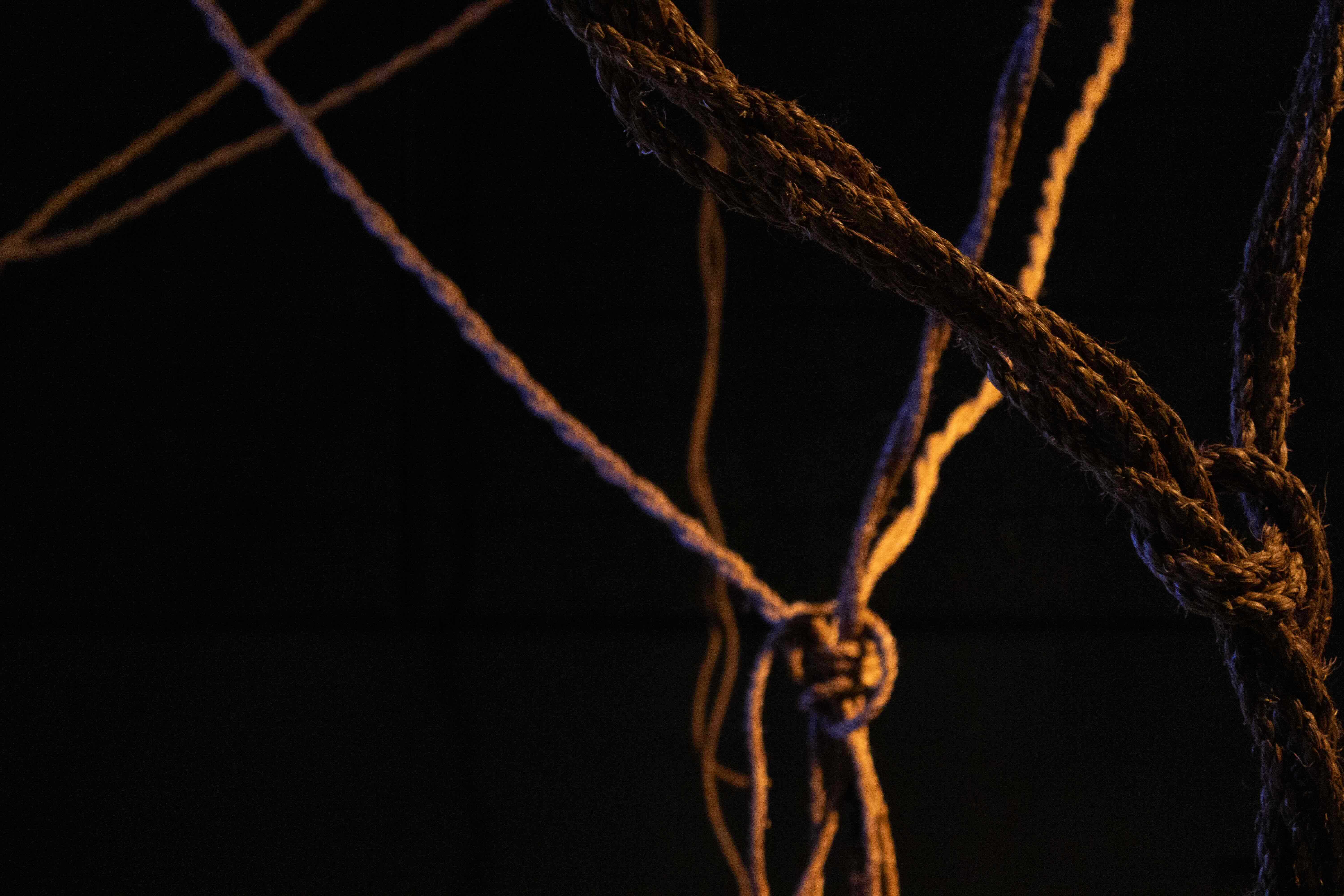 Close-up of illuminated rope installation detail