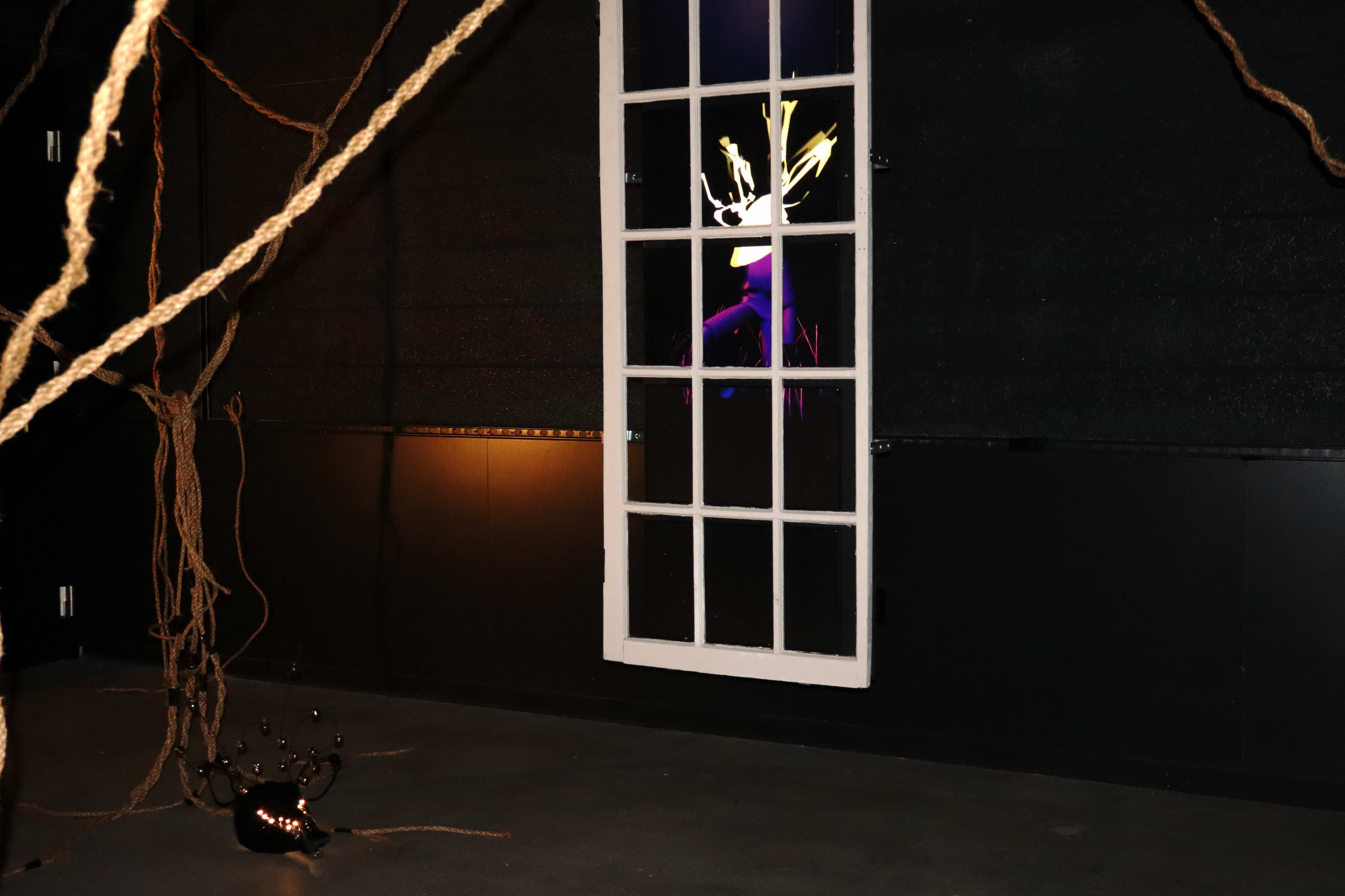 Installation detail with framed opening and lighting